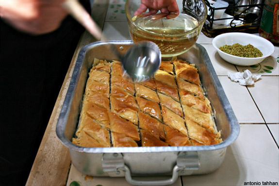 cool syrup on hot baklava