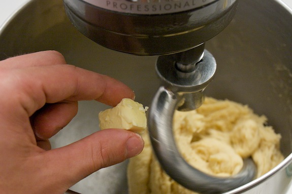 add butter piece by piece butter