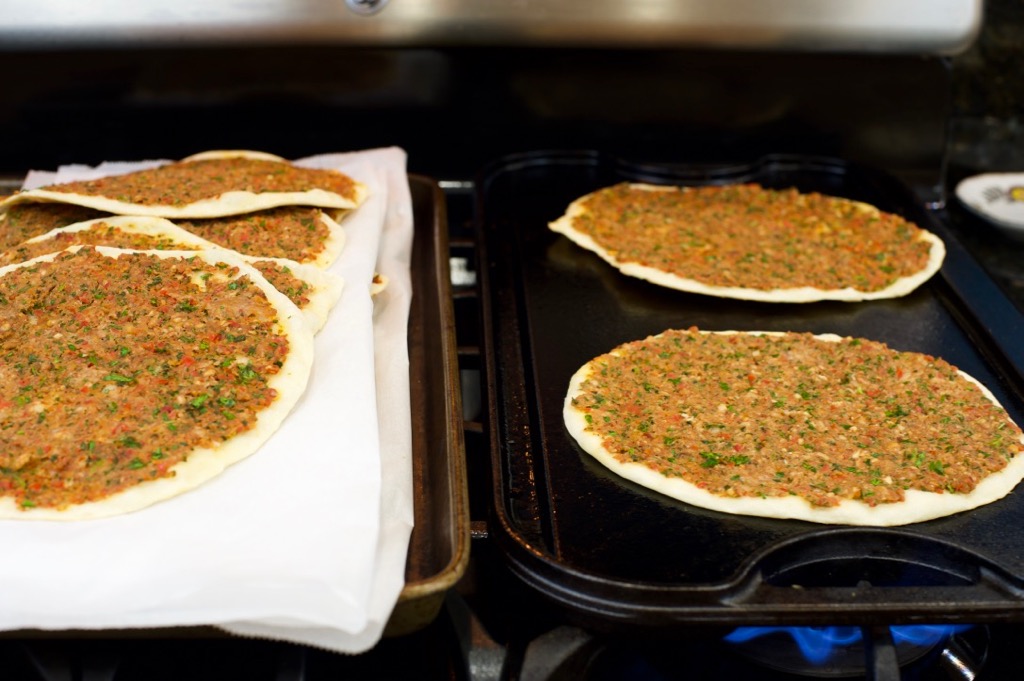 heaven cooking lahmajun on griddle