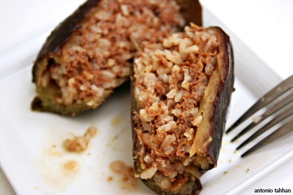 placing the eggplants in pot