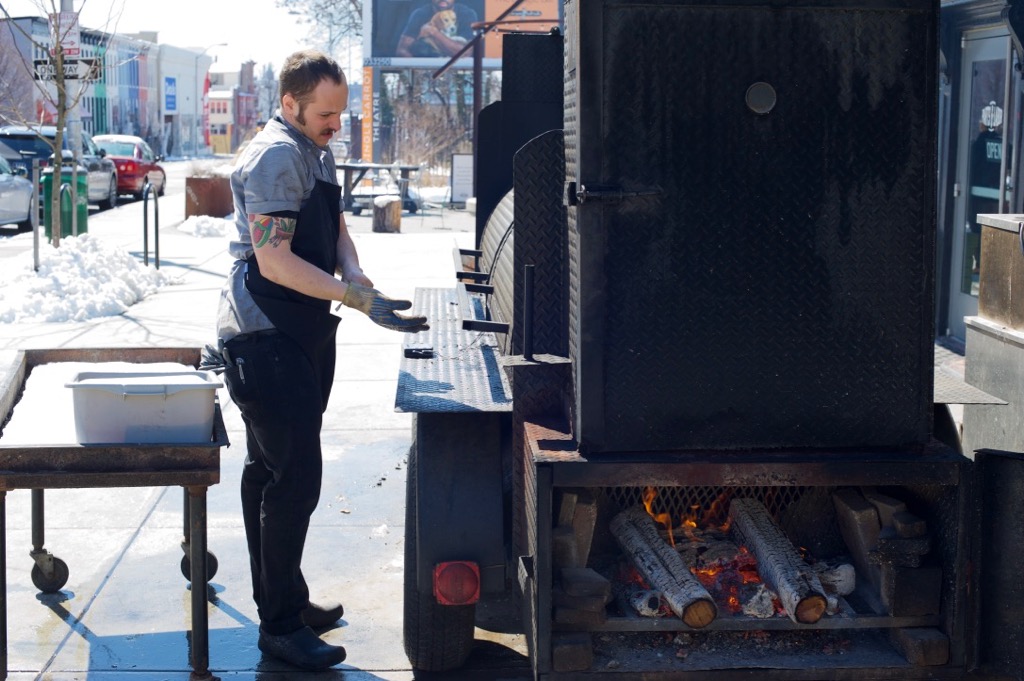 tending to the smoker