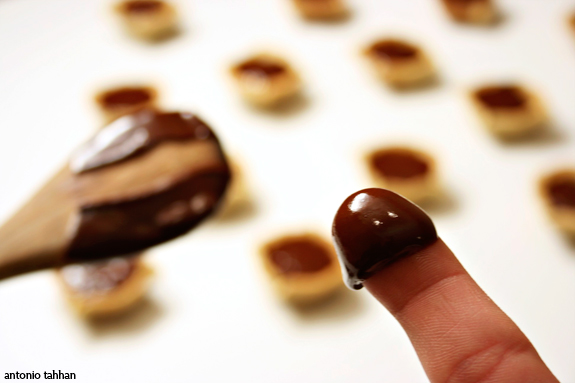 licking chocolate off spoon