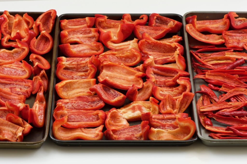 arrange cut peppers on baking sheets